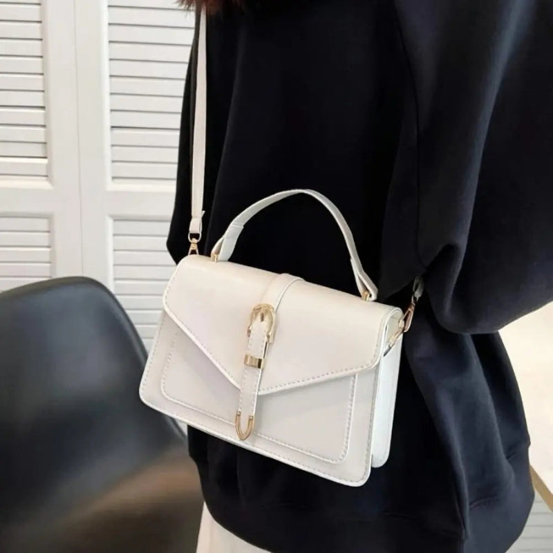 Clara – Sac à main structuré avec rabat à boucle et doubles bandoulières