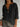 Jessa – Elegant V-neck blouse with button front and roll-up sleeves