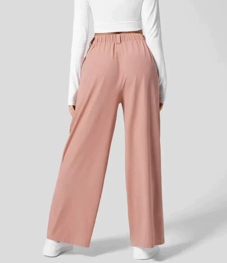 Mia – Pantalon large élégant avec coupe taille haute et poches latérales
